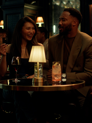 Couple enjoying drinks at Sapphire lounge